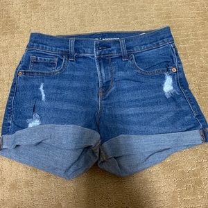 Cuffed denim shorts with distress